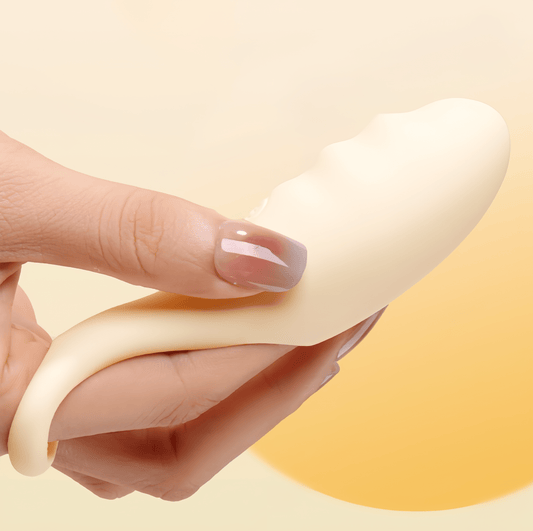 Actual photo of the vibrator worn on the finger: The product fits perfectly on the finger, showcasing its integrated, natural control design, addressing the hygiene concerns of long nails.