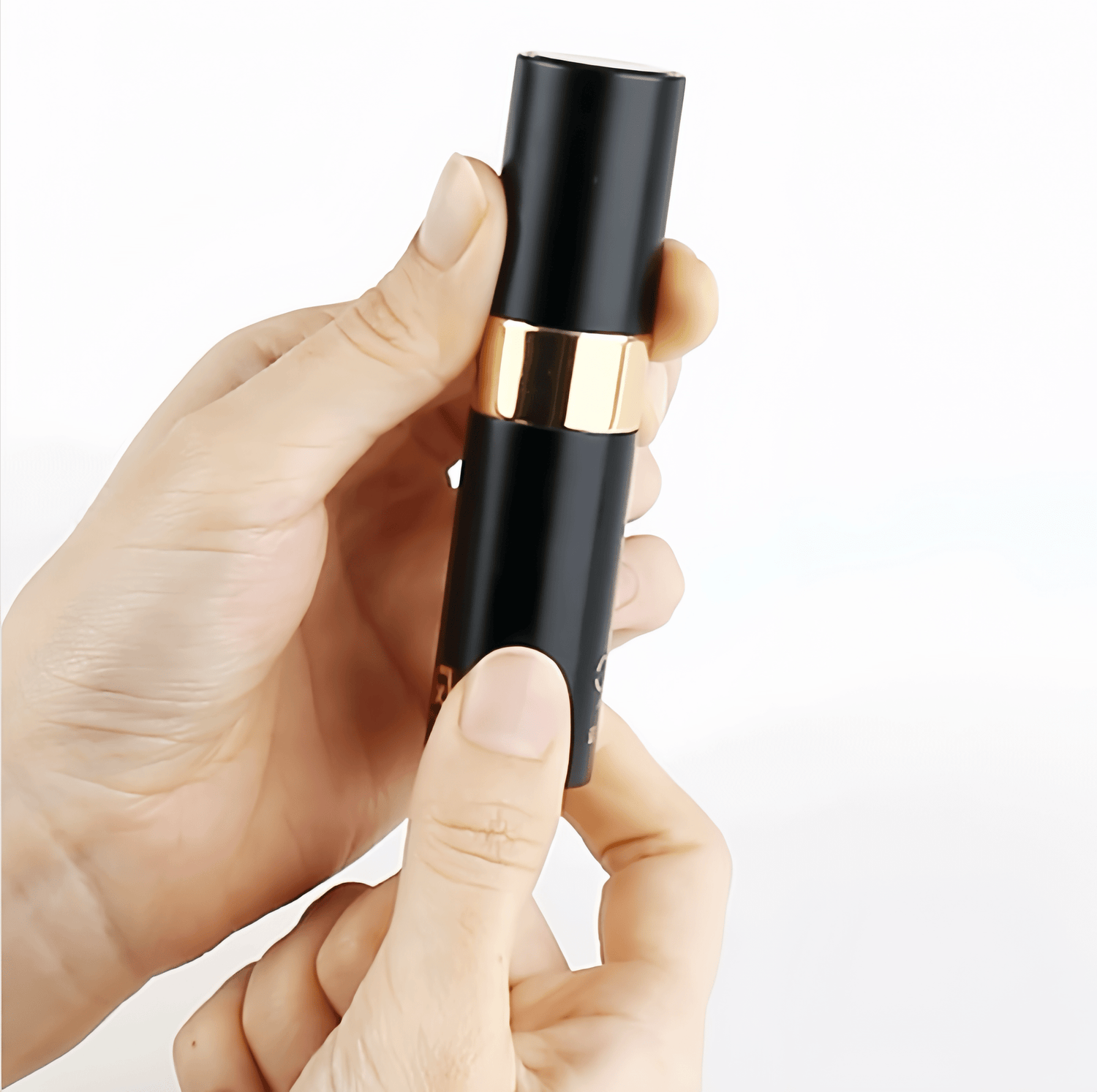 Minimalist black design with hidden nozzle, as private as lipstick.