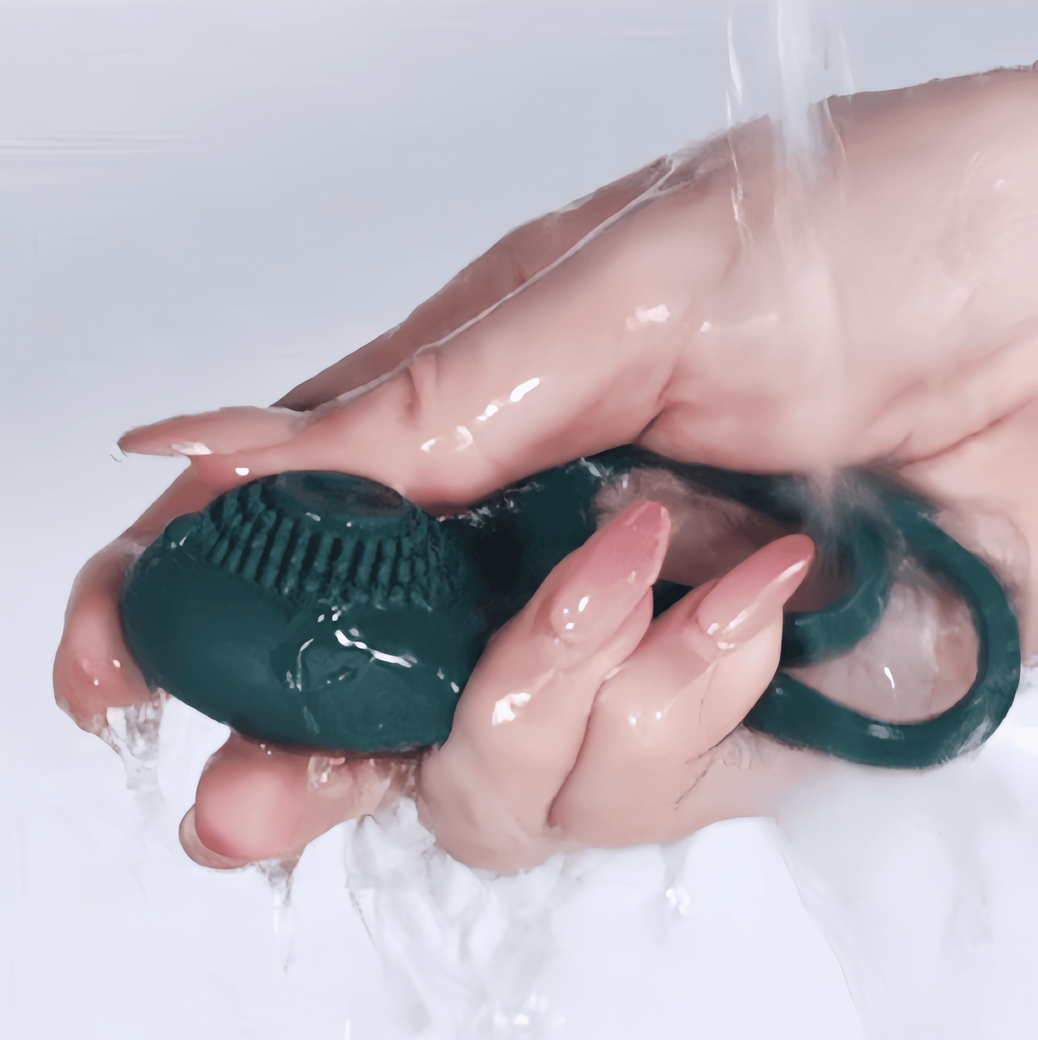 The product is displayed under a tap. Its one-piece design and IPX8 waterproof rating make cleaning and maintenance exceptionally simple.