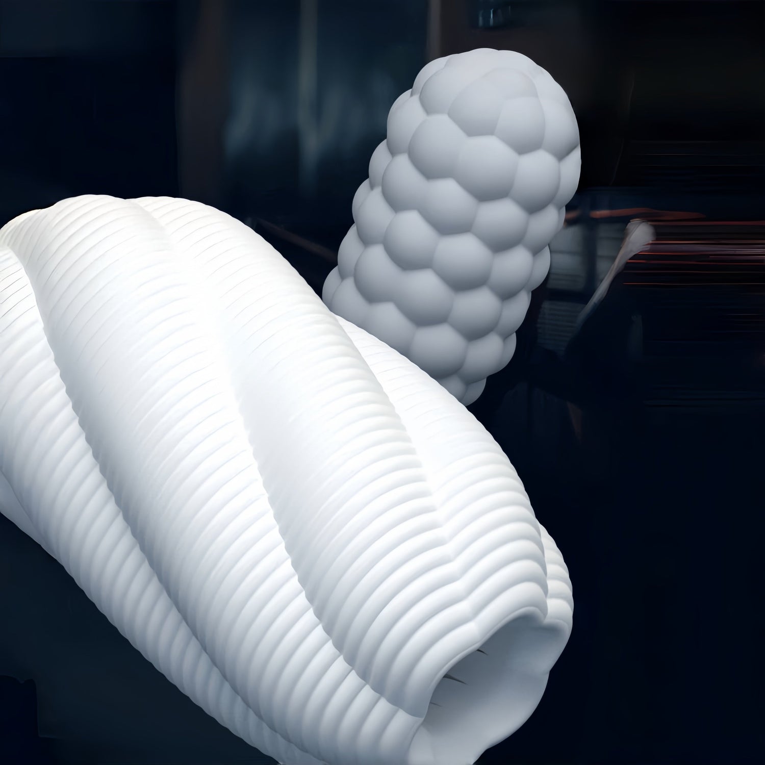 A close-up of the TPE material reveals its elastic, soft, and skin-friendly properties, along with its excellent ductility and flexibility, making it softer than skin.