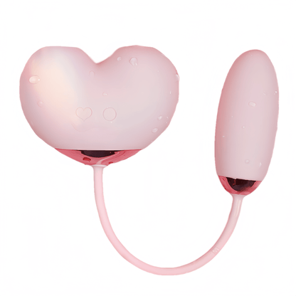 Close-up of the heart-shaped design in a warm peach pink color, eliminating the awkwardness of traditional sex toys.