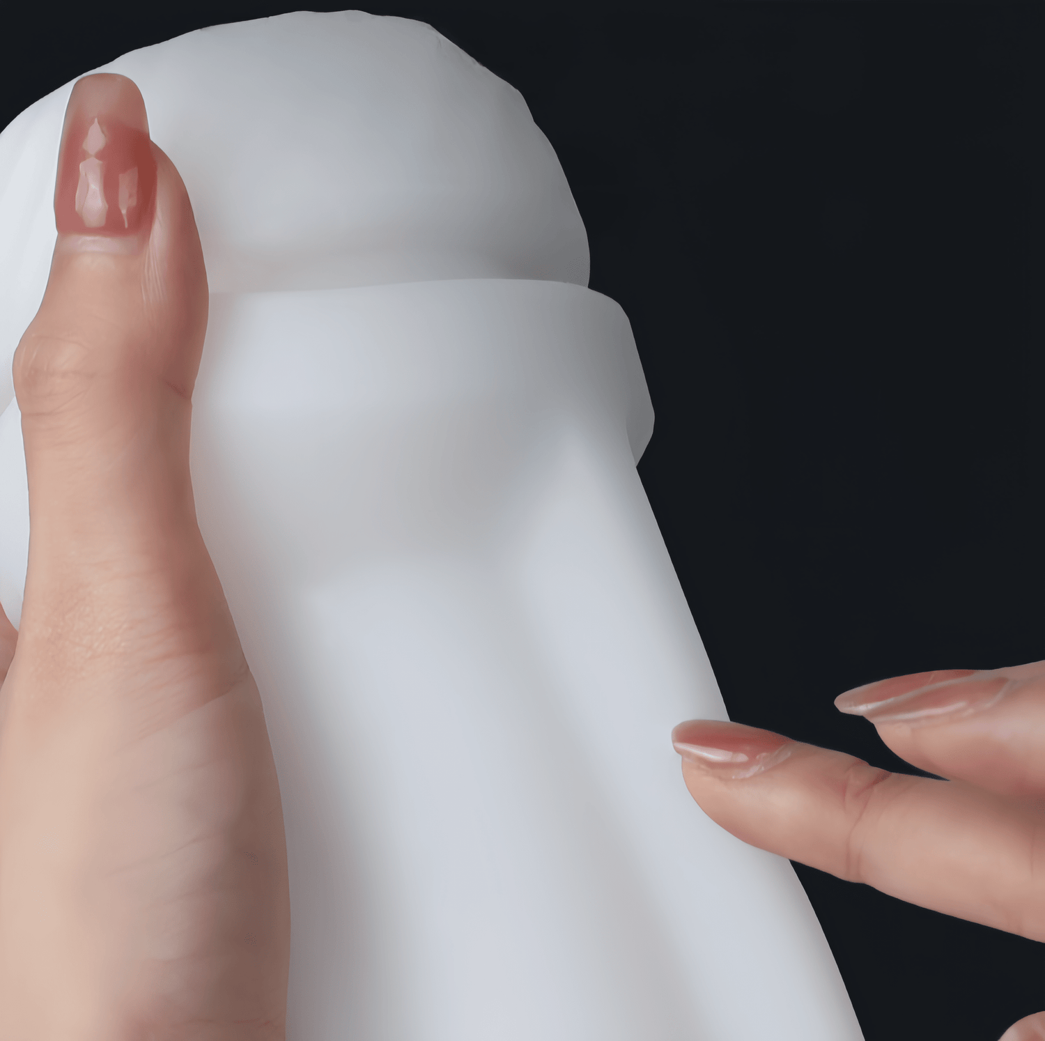 A close-up of the food-grade silicone material shows its soft, supple, and delicate feel, just like real skin.